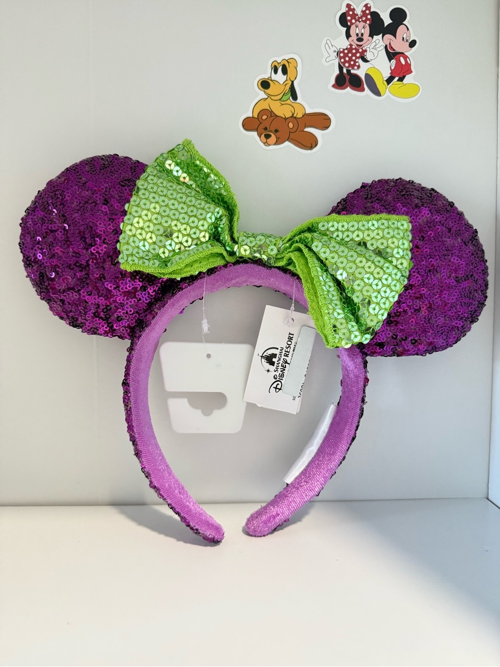 Disney Purple Sequin Minnie Ears Headband with Green Bow
